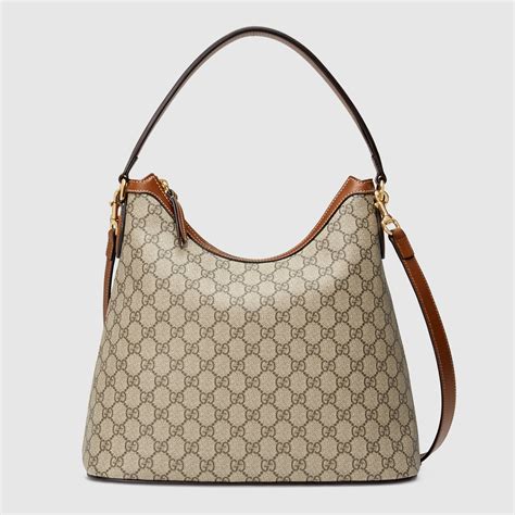 borsa shopping gucci in tessuto gg supreme|Borsa shopping GG misura media in tessuto GG Supreme nero.